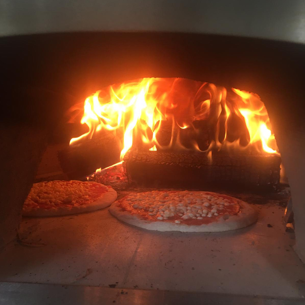Cooking in our Pizza Oven